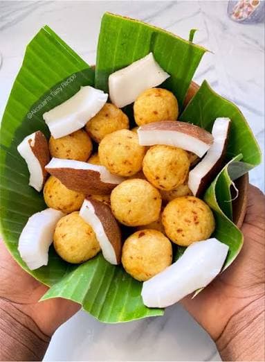 Coconut balls served with fresh coconut